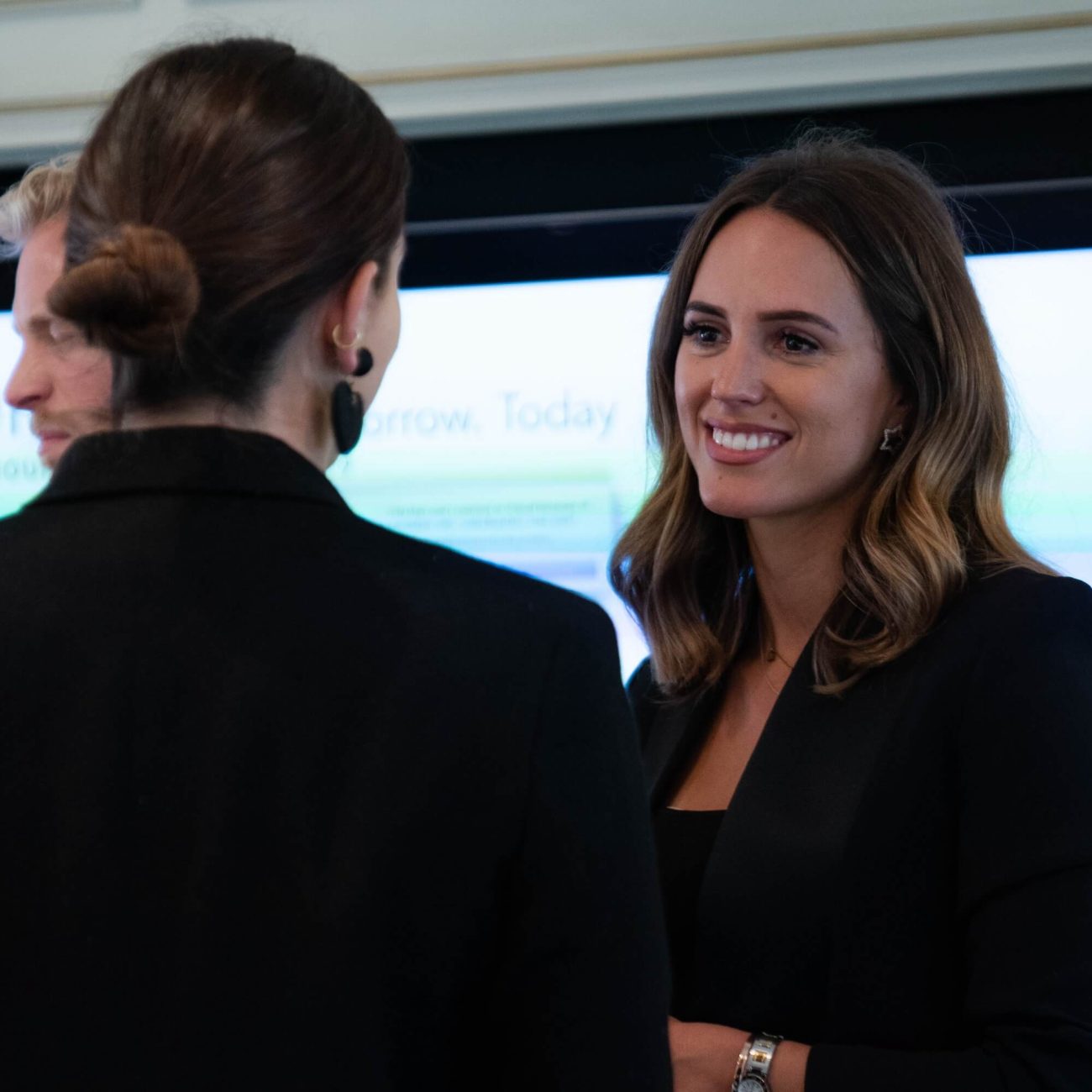 Emma Blackmore in conversation with a client